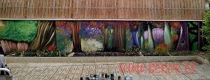pintura mural exterior vegetacion colores surrealistas